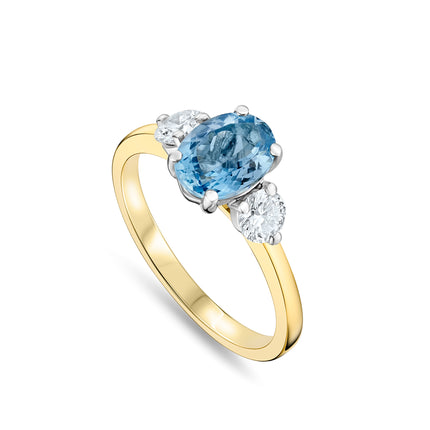 Oval Aquamarine and Diamond Trilogy Ring in Yellow Gold and Platinum