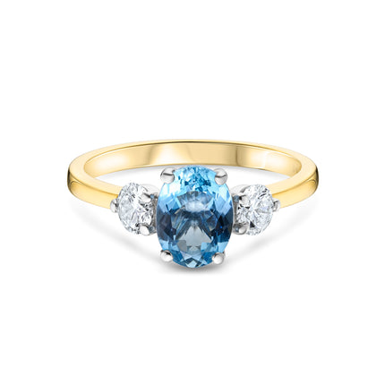 Oval Aquamarine and Diamond Trilogy Ring in Yellow Gold and Platinum