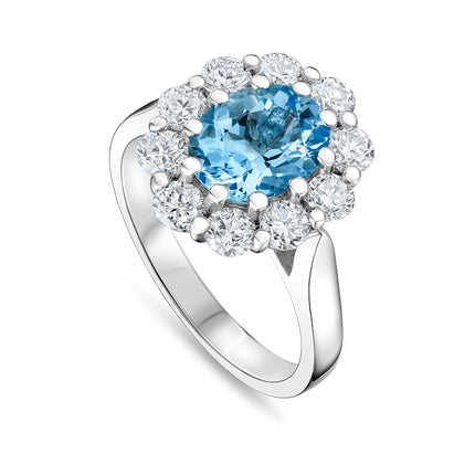 Oval Aquamarine and Diamond Cluster Ring in Platinum