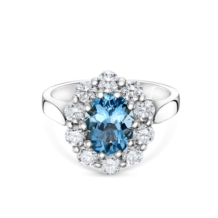 Oval Aquamarine and Diamond Cluster Ring in Platinum