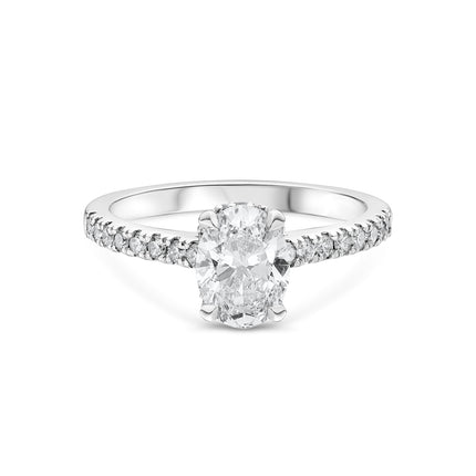 Oval Cut Solitaire Diamond Ring with Hidden Halo and Side Stones in Platinum