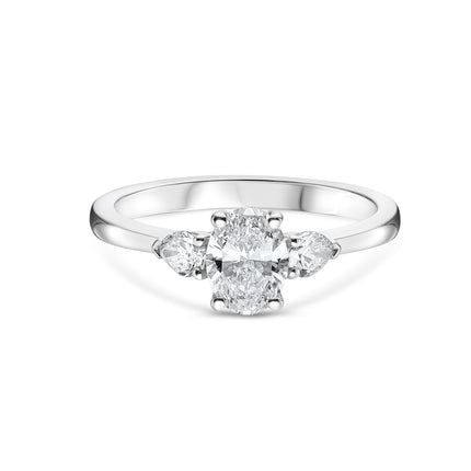 Oval and Pear Cut Diamond Trilogy Ring in Platinum