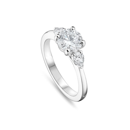 Round Brilliant Cut Diamond Trilogy Ring in Platinum