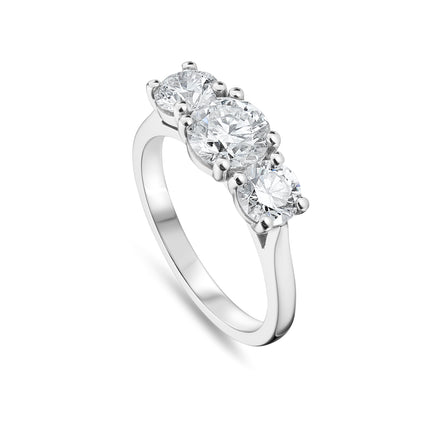 Round Brilliant Cut Diamond Trilogy Ring in Platinum