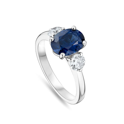 Oval Cut Sapphire and Diamond Trilogy Ring in Platinum