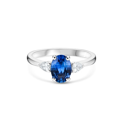 Oval Cut Sapphire and Diamond Trilogy Ring in Platinum