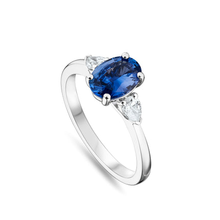 Oval Cut Sapphire and Diamond Trilogy Ring in Platinum