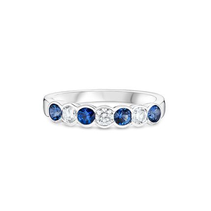 Round Cut Sapphire and Diamond Eternity Ring in Platinum