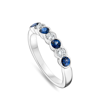 Round Cut Sapphire and Diamond Eternity Ring in Platinum