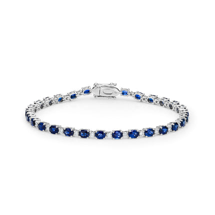 Oval Cut Sapphire and Diamond Tennis Bracelet in White Gold