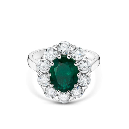 Oval Cut Emerald and Diamond Cluster Ring in Platinum