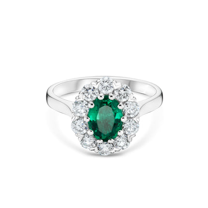 Oval Emerald and Diamond Cluster Ring in Platinum