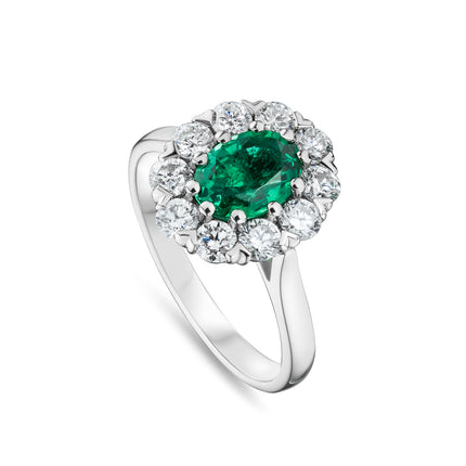 Oval Cut Emerald and Diamond Cluster Ring in Platinum