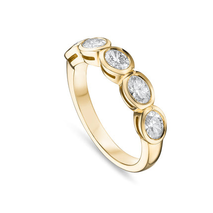 Medium Oval Cut Diamond Bezel Set Band in Yellow Gold