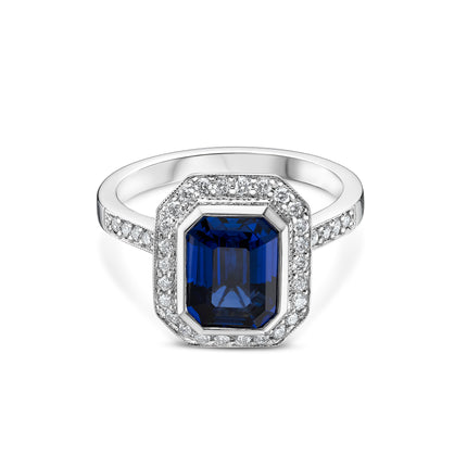 Emerald Cut Sapphire and Diamond Halo Ring in Platinum