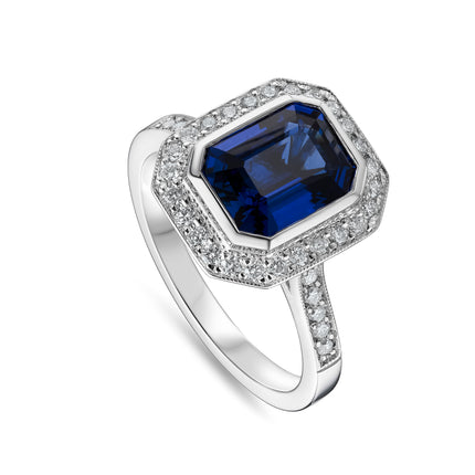 Emerald Cut Sapphire and Diamond Halo Ring in Platinum